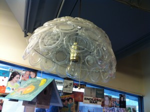 Lamp made from take out lids as part of Calhouns' sustainable art and science program. This project was called Dumpster Dive Design. 