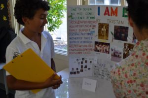 Students share their genealogy and their History Projects with parents and peers during Heritage Night.